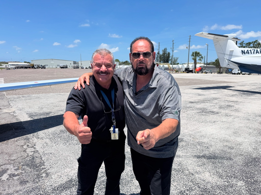 Captain Frank with an aviation colleague on the ramp