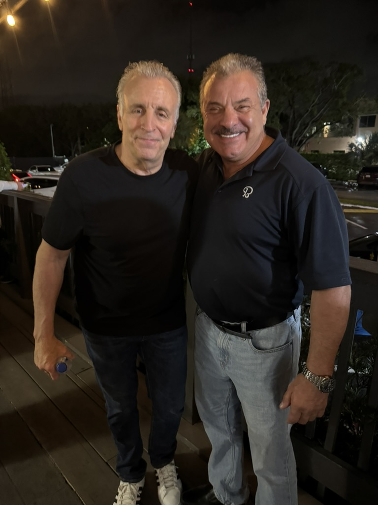 Captain Frank with a friend during an evening aviation trip
