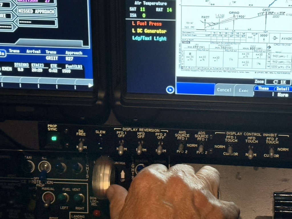 Cockpit controls and approach chart during flight deck setup